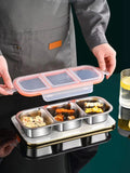 Stainless steel mini lunch box with compartments for light meals, specially designed for weight loss and portion control, suitable for use in the microwave. Stainless steel fruit preservation lightweight meal box with three compartments, sealed and portab