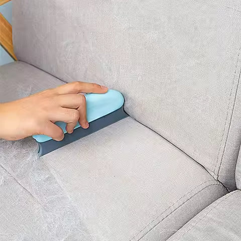 Effective pet hair remover brush for cats and dogs - gently shaves wool and cleans fur for a neat and tidy home
